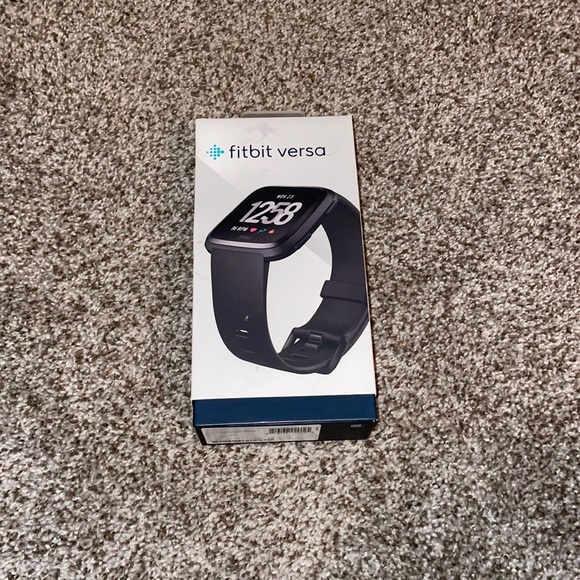 Fitbit Versa with charging stand - Picture 1 of 6